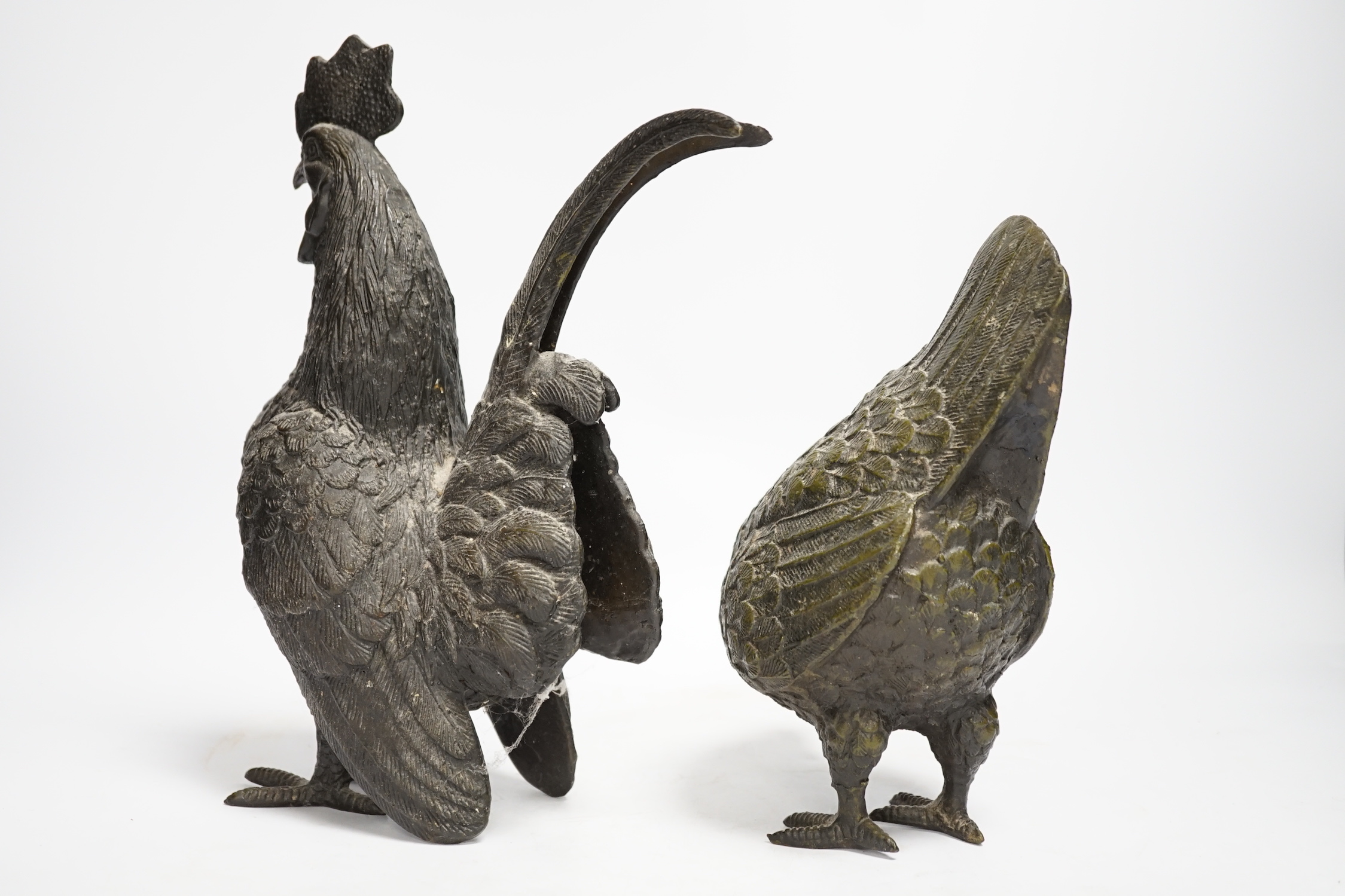 A pair of modern bronze models of a cockerel and chicken, largest 29cm high